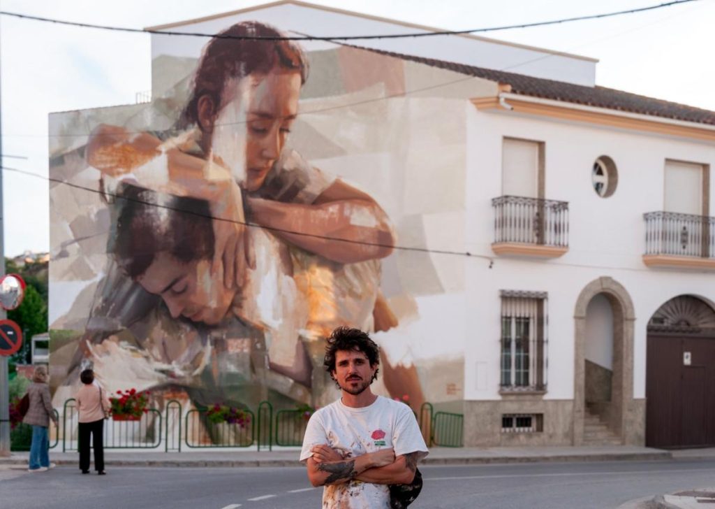 Graffiti sui marciapiedi di Napoli per annunciare la mostra di Guido Palmadessa